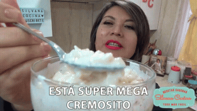 Woman Holding Spoon Over Bowl Saying Esta Super Mega Cremoso GIF