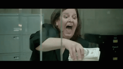 Woman Holding Stack of Money Screaming