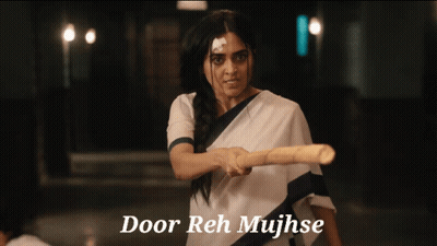 Woman Holding Stick Saying Door Reh Mujhse GIF