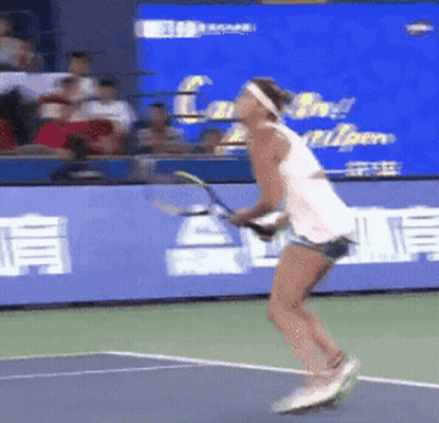 Woman Holding Tennis Racquet GIF