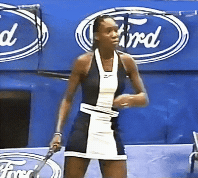 Woman Holding Tennis Racquet In Front Of Ford Ad GIF