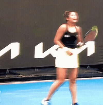 Woman Holding Tennis Racquet On Blue Court BMW Sign GIF