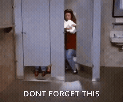 Woman Holding Toilet Paper In Restroom GIF