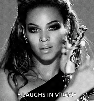 Woman Holding Trophy And Laughing In Virgo GIF