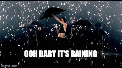 Woman Holding Umbrella In Rain Saying Ooh Baby It Rains GIF