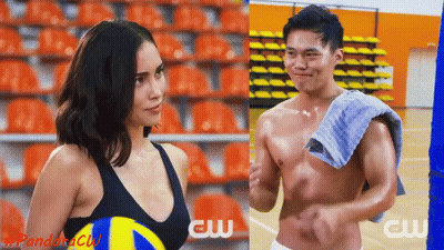 Woman Holding Volleyball Next to Shirtless Man With Towel
