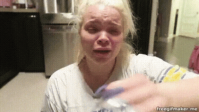 Woman Holding Water Bottle Crying GIF