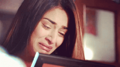 Woman Holding Water Bottle Crying GIF