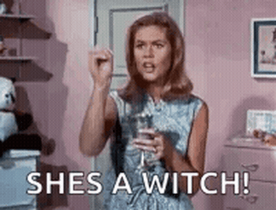 Woman Holding Water Glass Saying I'm A Witch GIF