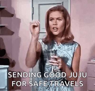 Woman Holding Water Glass Sending Good Juju GIF