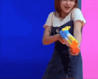 Woman Holding Water Gun GIF