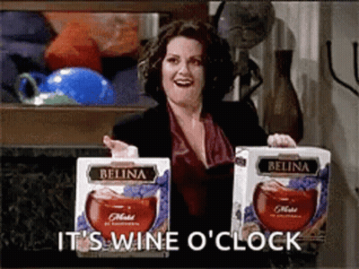 Woman Holding Wine Boxes Saying It's Wine O'Clock GIF