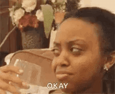Woman Holding Wine Glass Making Funny Face GIF