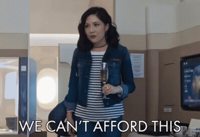 Woman Holding Wine Glass Saying We Cant Afford This GIF