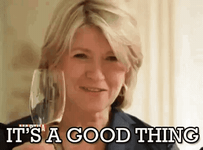 Woman Holding Wine Smiling Saying It's A Good Thing GIF