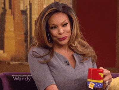 Woman Holding Wonder Woman Cup GIF