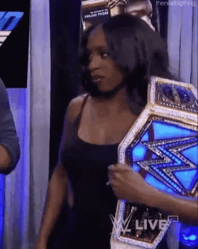 Woman Holding Wrestling Championship Belt GIF