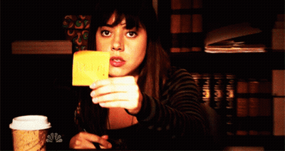 Woman Holding Yellow Help Note