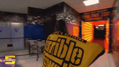 Woman Holding Yellow Shirt Saying Incredible GIF