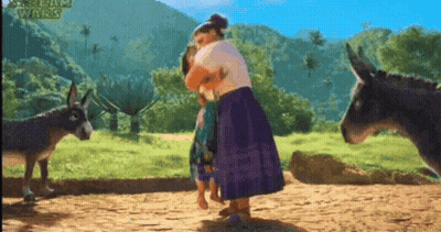Woman Hugging Child Next To Donkey GIF