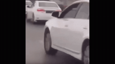 Woman Hugging Man At Desk GIF