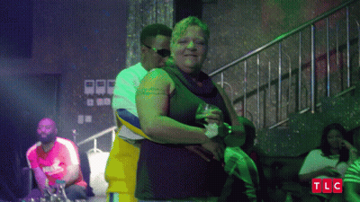 Woman Hugging Man In Club TLC GIF