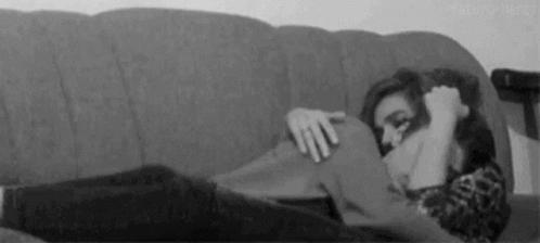 Woman Hugging Man On Couch GIF
