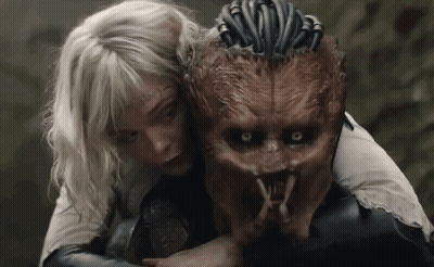 Woman Hugging Monster With Dreadlock GIF
