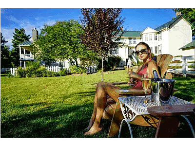 Woman In Adirondack Chair With Champagne Sticker