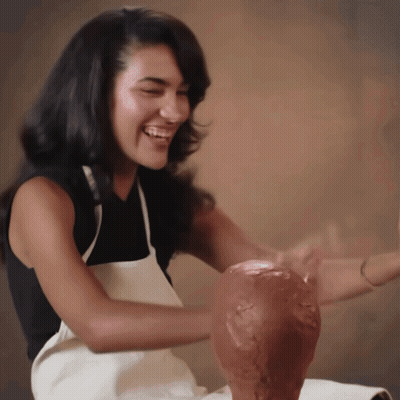 Woman In Apron Making Clay Pot GIF