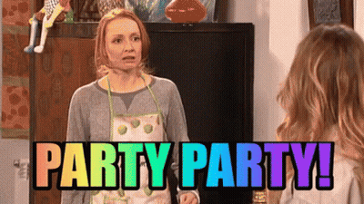Woman In Apron Next To Woman Saying Party Party GIF