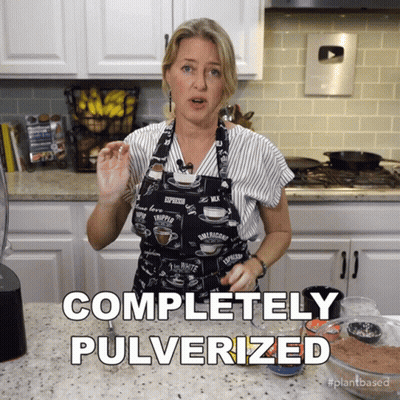 Woman In Apron Saying Completely Pulverized GIF