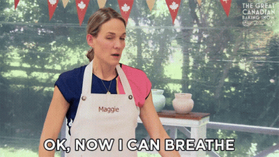 Woman In Apron Saying Maggie Says Ok Now I Can Breathe GIF