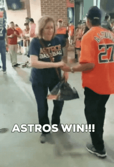 Woman In Astros Shirt Shaking Hands GIF