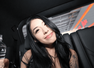 Woman In Back Seat Of Car With Aquafina Water GIF