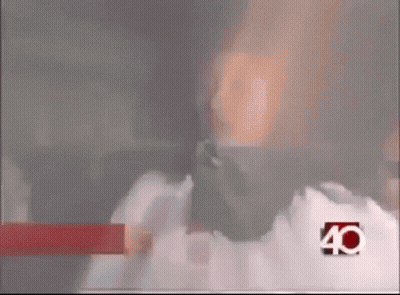 Woman In Bandana Talking Into Microphone With Number 40 Jacket GIF