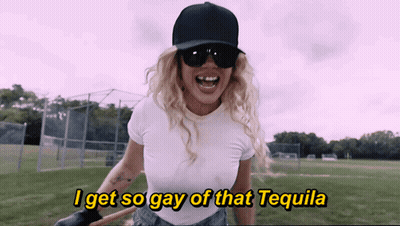 Woman In Baseball Cap And Sunglasses Saying I Get So Gay Of That Tequila GIF