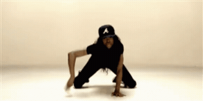 Woman In Baseball Cap Kneeling GIF