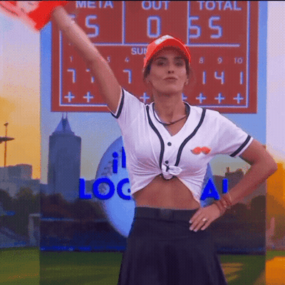 Woman In Baseball Uniform In Front Of Scoreboard 5 To 0 GIF