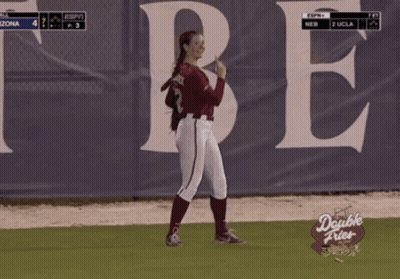 Woman In Baseball Uniform Number 32 GIF