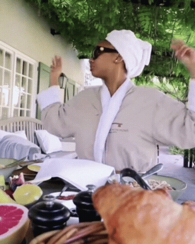 Woman in Bathrobe Dancing