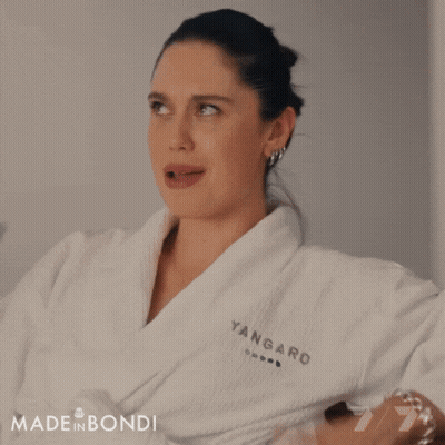 Woman In Bathrobe Saying It's My Birthday GIF