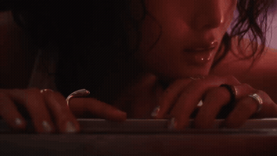 Woman In Bathtub Looking At Mirror GIF
