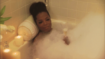 Woman In Bathtub With Glass Of Wine GIF