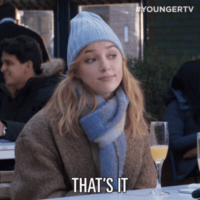 Woman In Beanie And Scarf Says That GIF