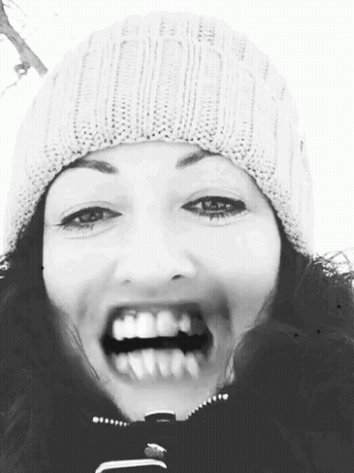Woman In Beanie Smiling GIF