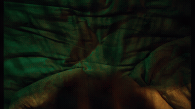 Woman In Bed Wearing Chicago Shirt GIF
