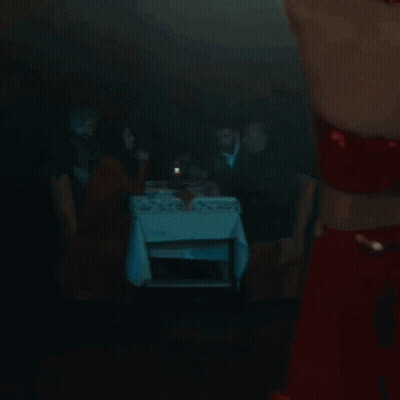 Woman In Belly Dance Costume Dancing With Hands In Hair GIF