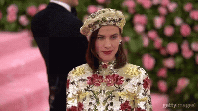 Woman In Beret And Sequined Dress GIF