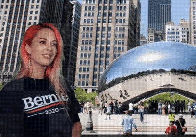 Woman In Bernie 2020 Shirt At The Bean GIF